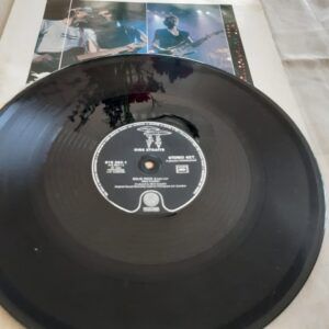 Dire Straits – Solid Rock (Live) / Love Over Gold (Live) (1984) | Maxi-Single 12” | VG / Fair (carátula)