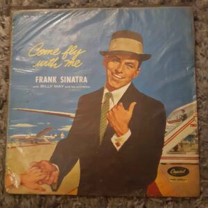 Frank Sinatra – Come Fly With Me (Ven a Volar Conmigo) (1958, reedición chilena años 60s) | Vinilo sin rallas, CON GRANO